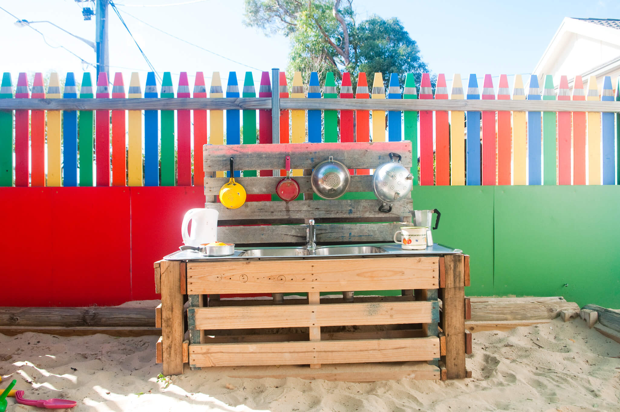 smiling girl playing with ribbons