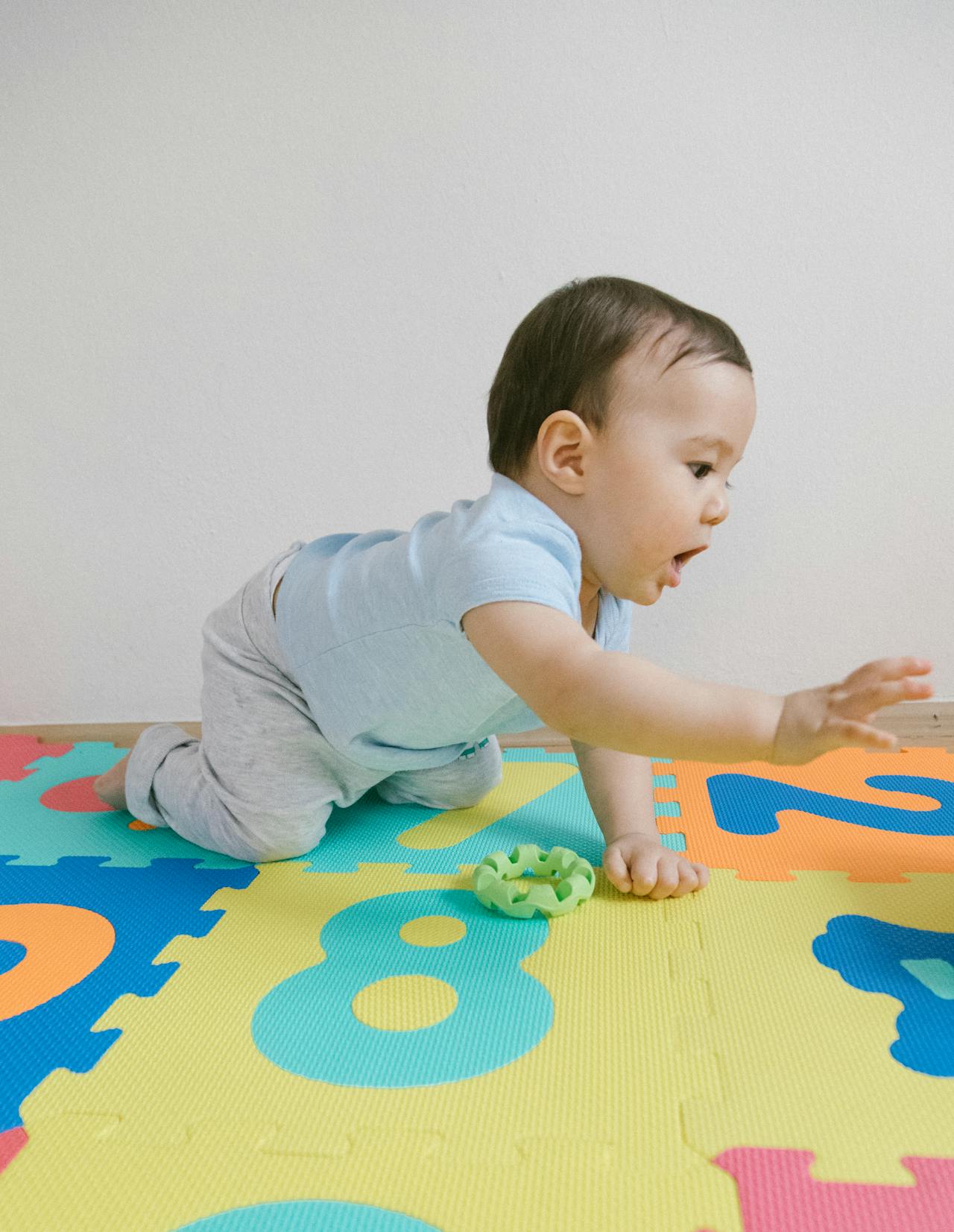 little baby girl playing iwht blocks