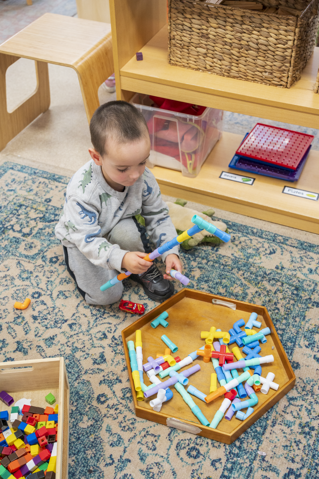 a little boy playing indoor