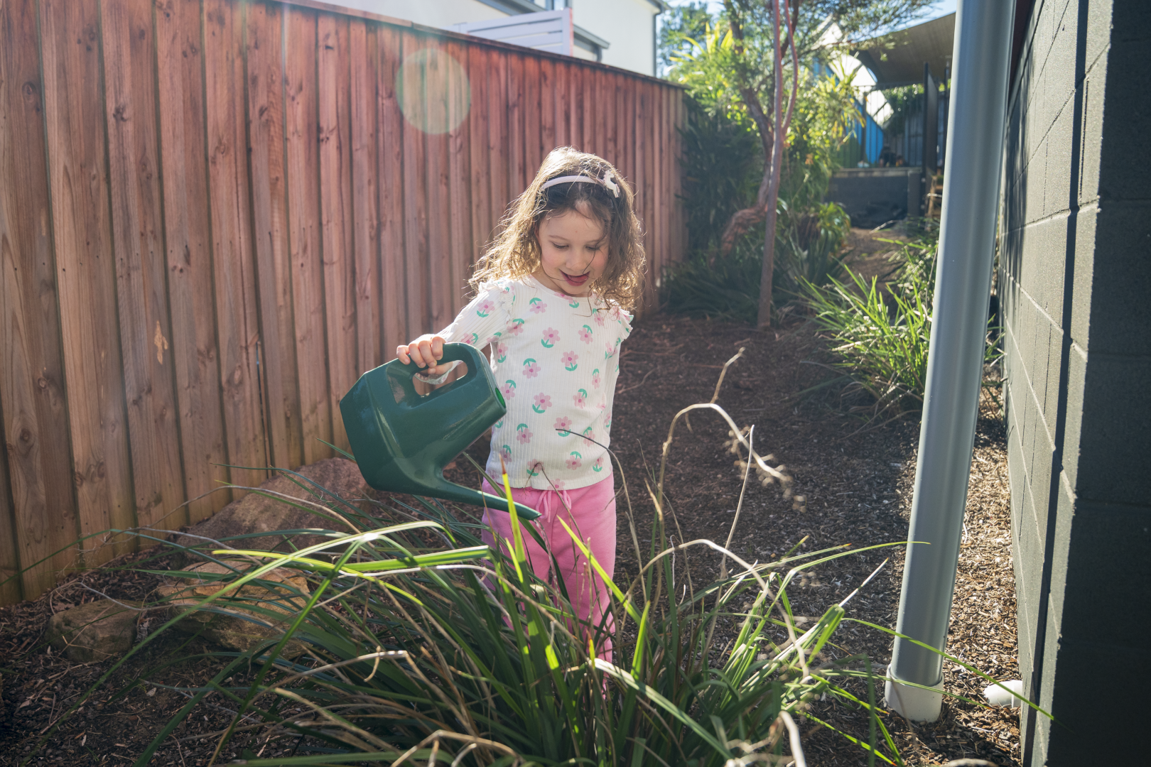 little girl gardening